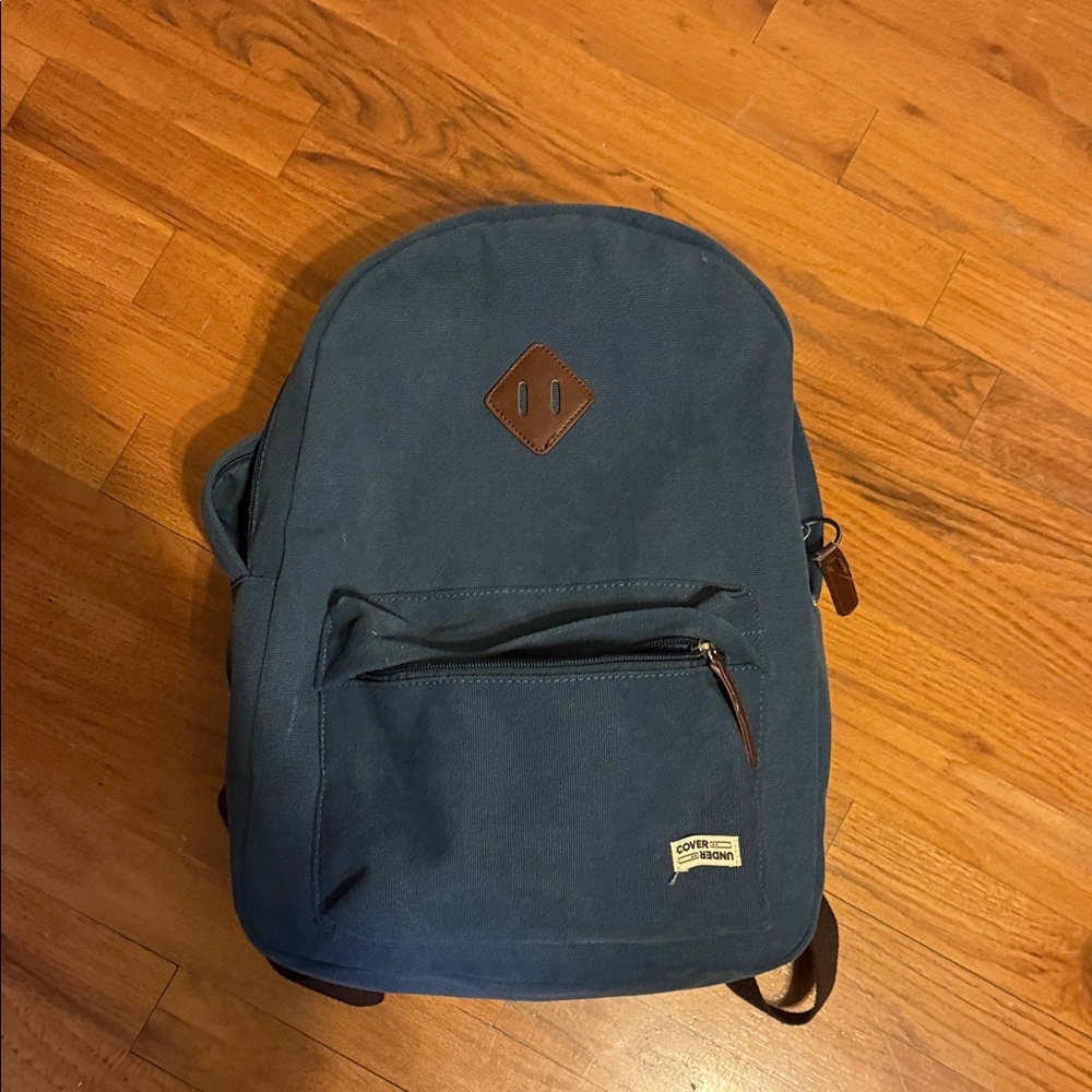 Canvas Navy Backpack with Brown Accents